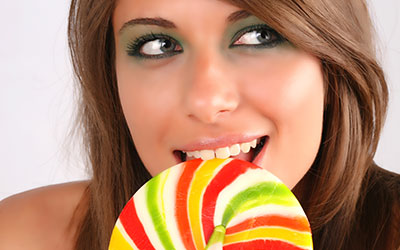 Woman with huge lollipop