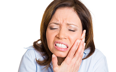 Woman with tooth pain