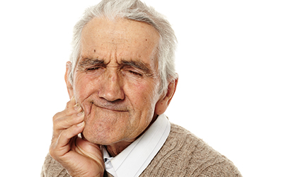 Old man with tooth ache