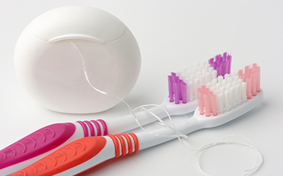 Toothbrush and floss