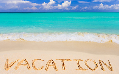 Word vacation on beach