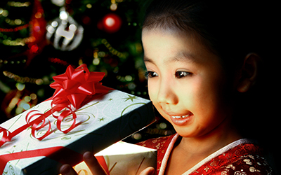 Child opening a present