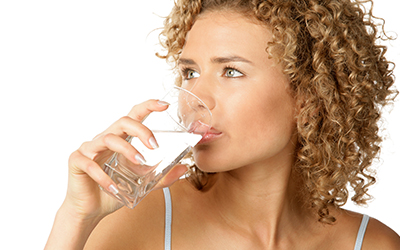 A woman drinking water