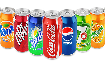 A variety of soda cans just as Sprite, Fanta and Pepsi
