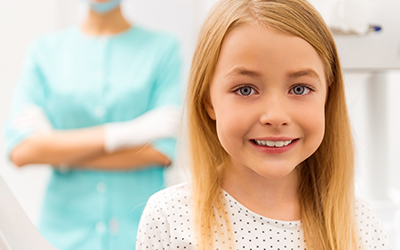 A young girl in a dental office